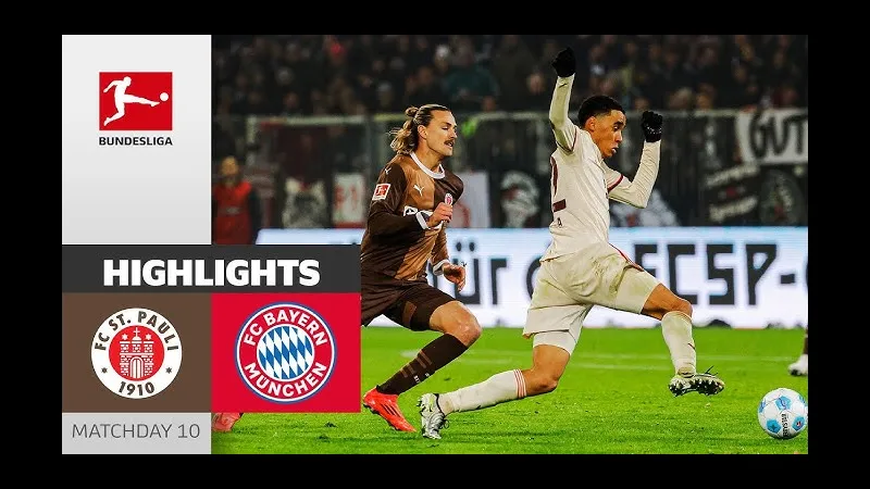 Cầu thủ Bayern Munich đi bóng qua cầu thủ St. Pauli trong trận đấu Cầu thủ Bayern Munich đi bóng qua cầu thủ St. Pauli trong trận đấu